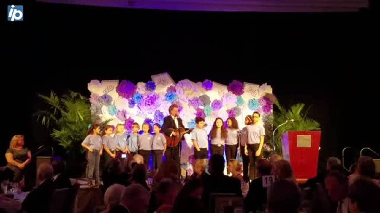 Local singer Gregg Russell and the Boys & Girls Club put on touching performance of “Hurricane Matthew”