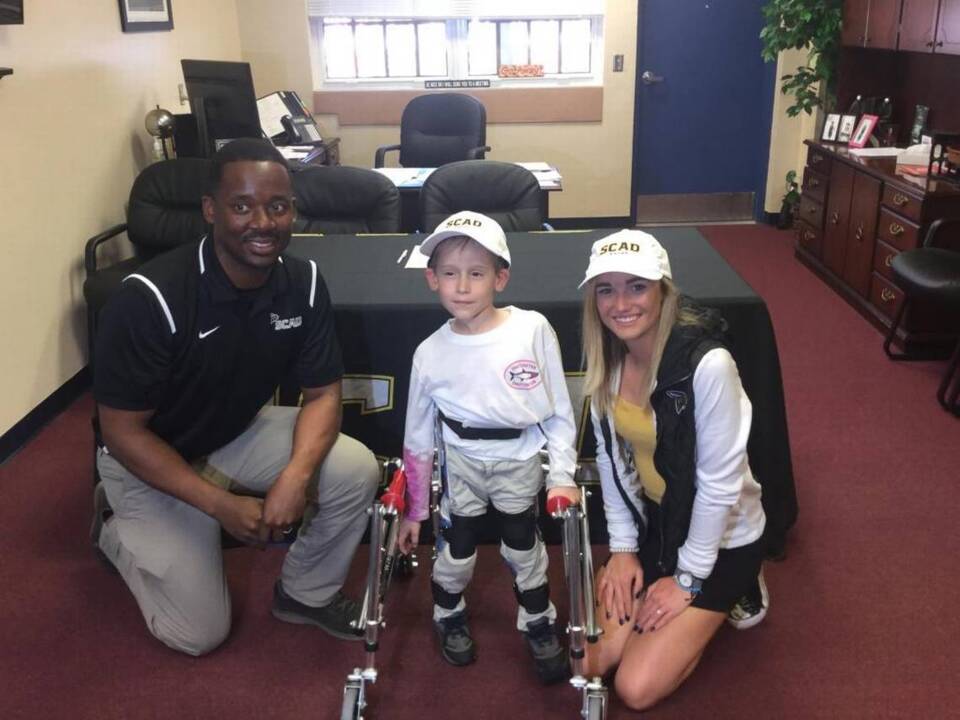 Before signing scholarship, Manatee High student gets big surprise from first-grader with spina bifida