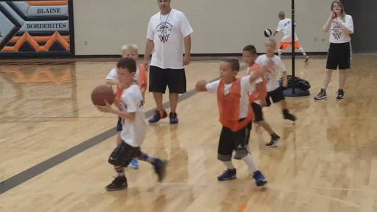 Retired NBA star Luke Ridnour teaches kids how to be brave in basketball  camp