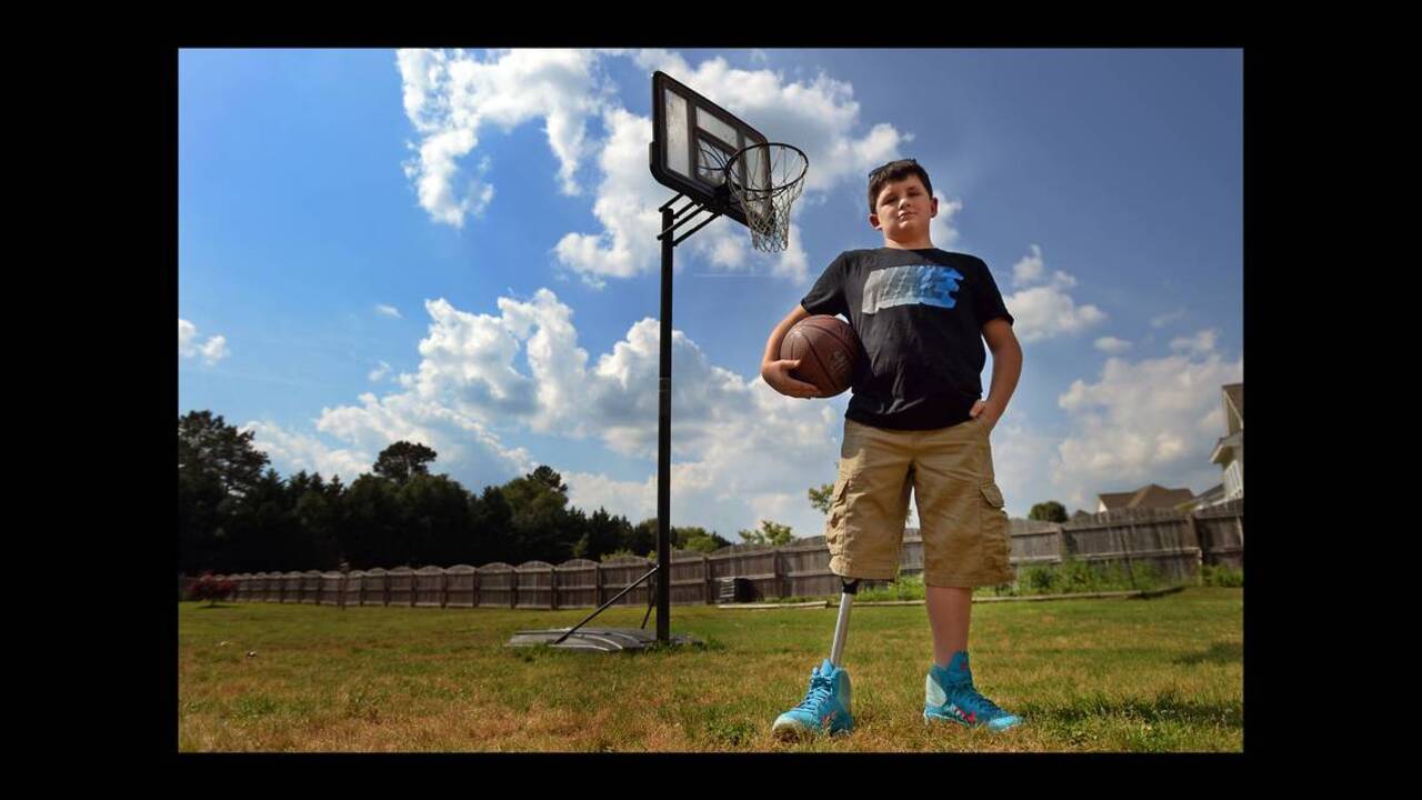 Raleigh boy part of national campaign about the dangers of lawn mowers