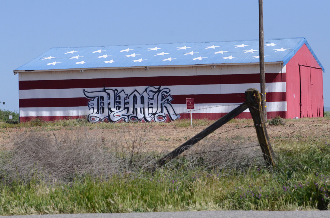 American flag barn in Madera vandalized by tagger
