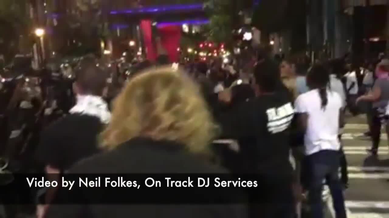 Police arrest Charlotte protester chanting 'Love'