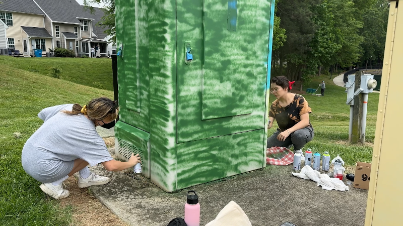 Video: Queens University artists make over utility boxes