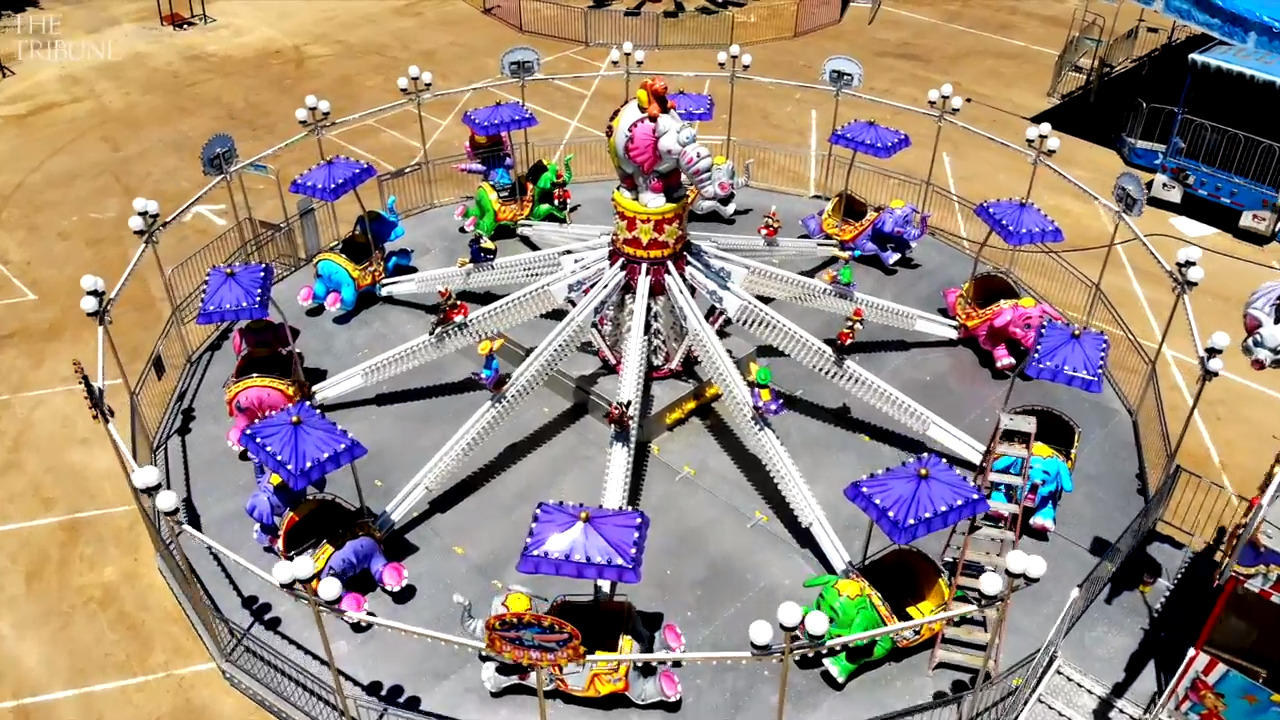 See California Mid-State Fair rides being set up from the air