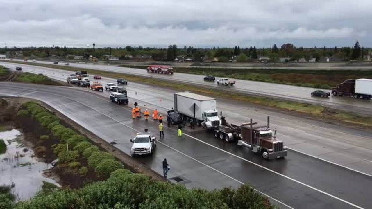 Big rig crosses Highway 99 median, strikes car in Merced (Video ...