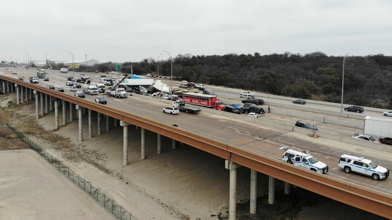 Drone footage shows cleanup effort to remove dozens of vehicles involved in massive pile-up
