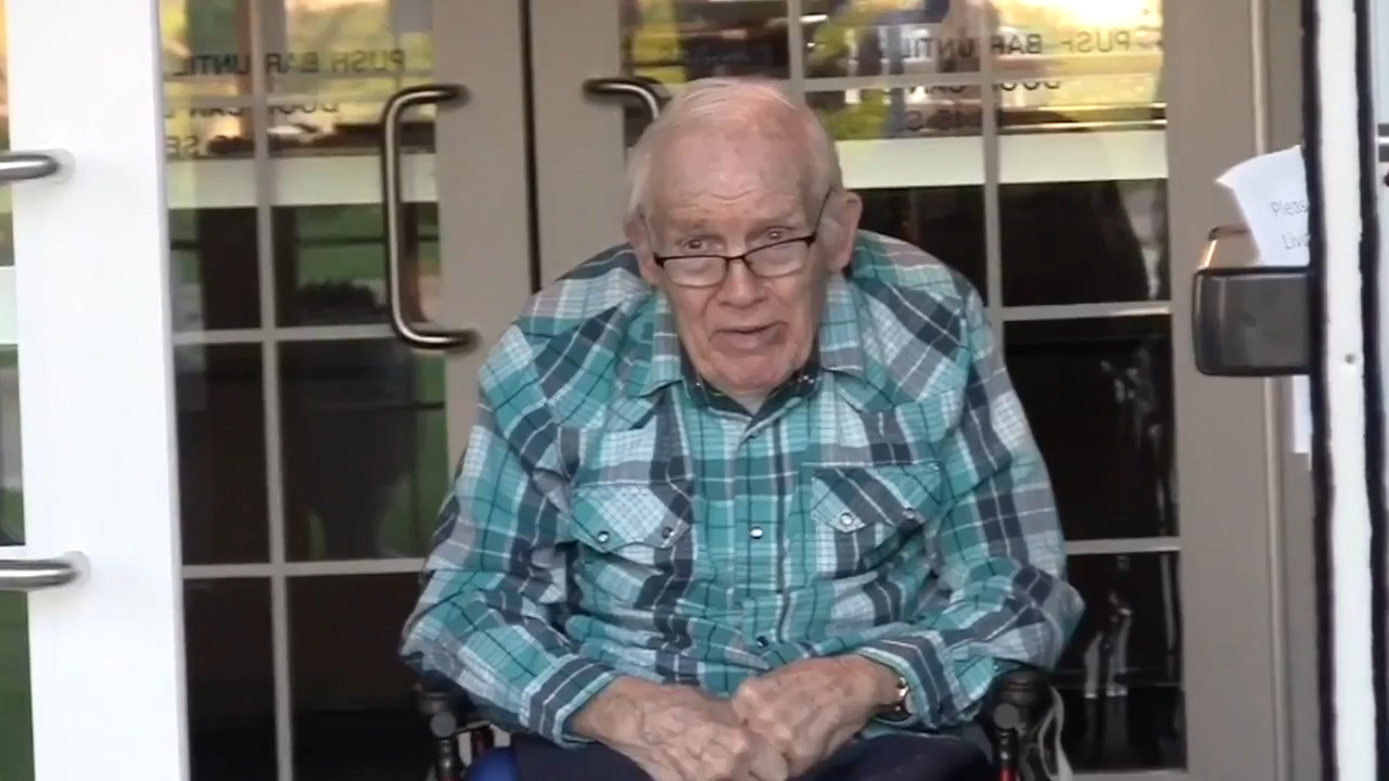 Assisted living facility resident sees granddaughter on wedding day during coronavirus pandemic