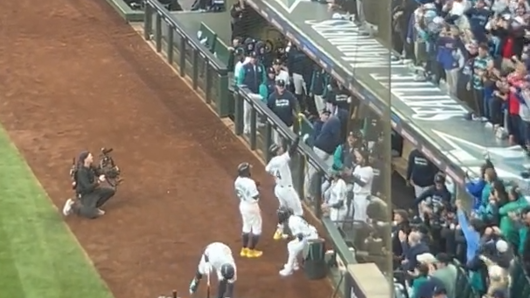 Julio Rodriguez homers, goes trident-up in Mariners dugout 1st innings ALCS Game 3 at rockin' T-Mobile Park