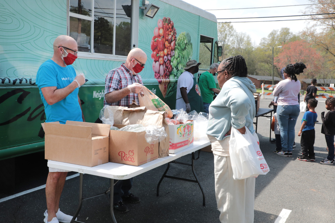 ‘Being Americans again’: How these volunteers weigh safety, service during COVID-19.