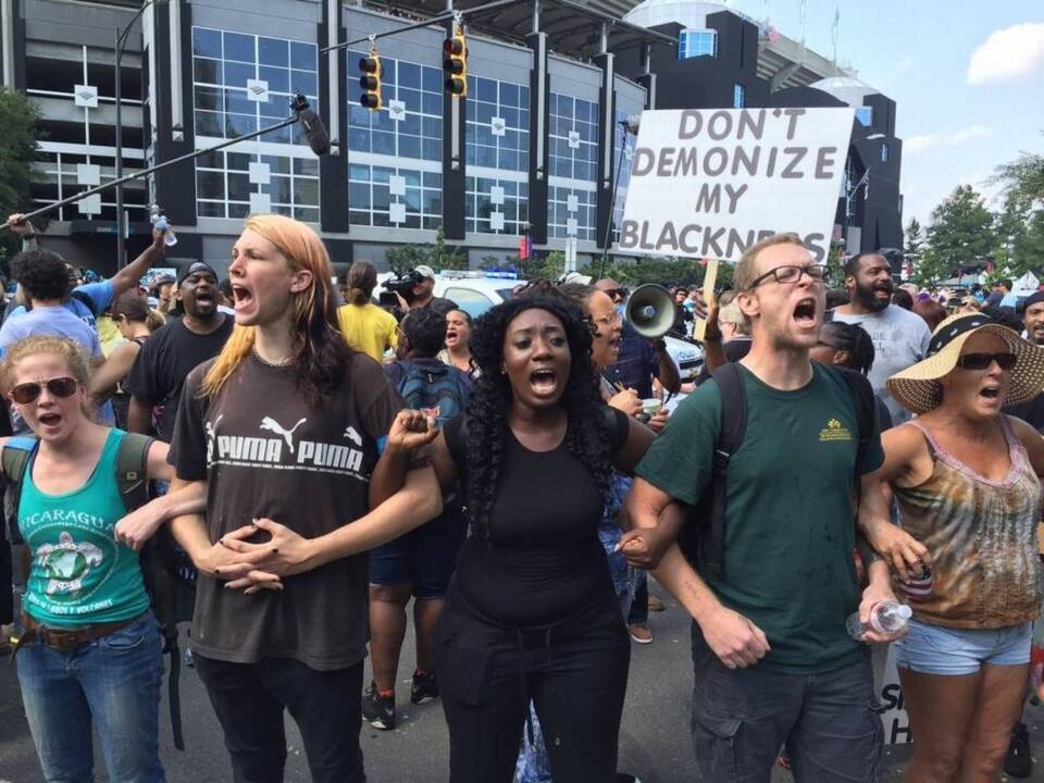 Peaceful demonstrators stage rally outside Bank of America Stadium