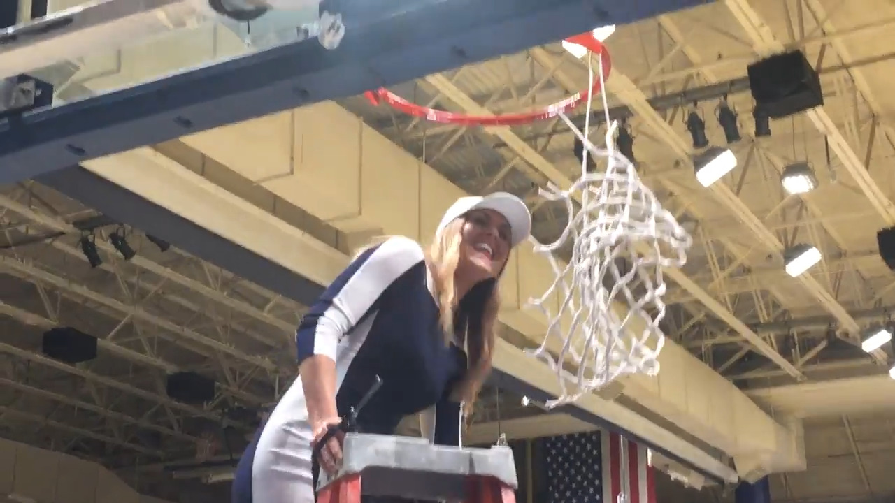Kansas City Roos women’s coach Jacie Hoyt cuts net