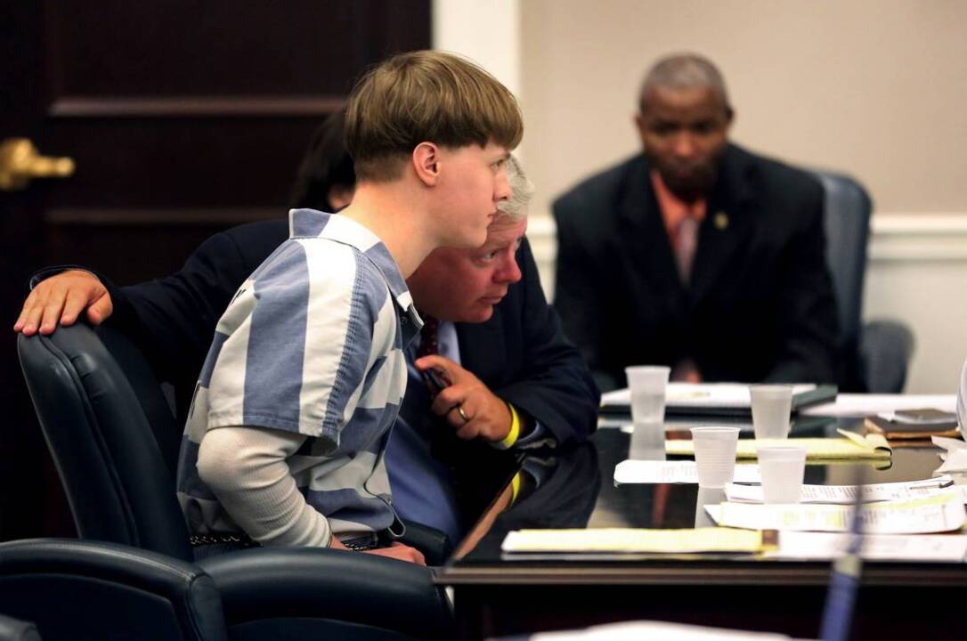 A woman wanted to commit a mass murder – so she contacted Dylann Roof, authorities say