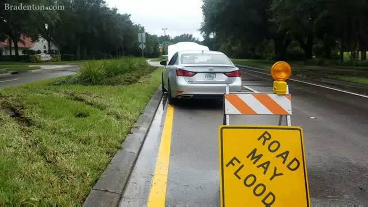 Driver got stuck in flooded East Manatee County road | San Luis Obispo ...