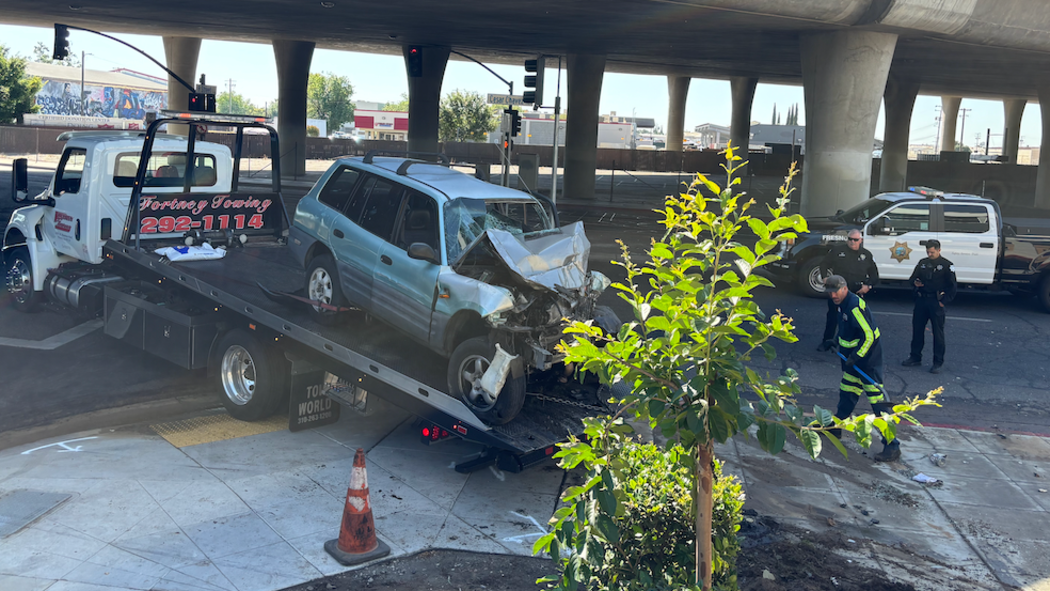 One woman killed after crashing into downtown Fresno building, police say