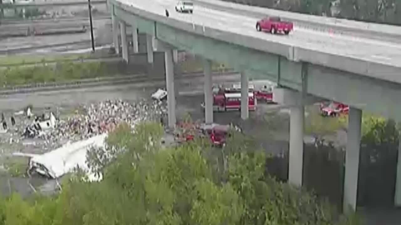 Semi truck falls off overpass on I-670 in KCK (Video) | Kansas City Star