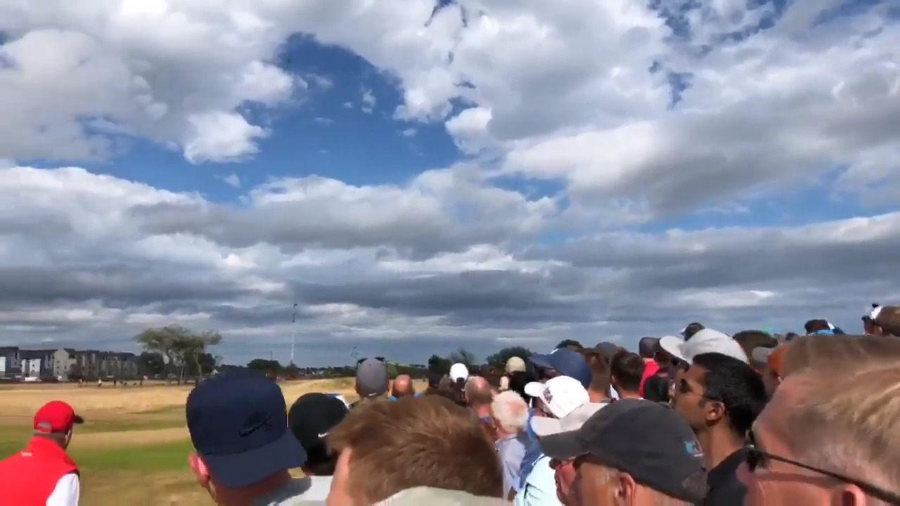 Golf fan hit by errant Tiger Woods shot at British Open