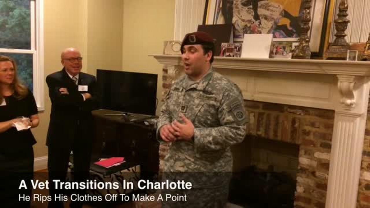 Veteran strips to make a point
