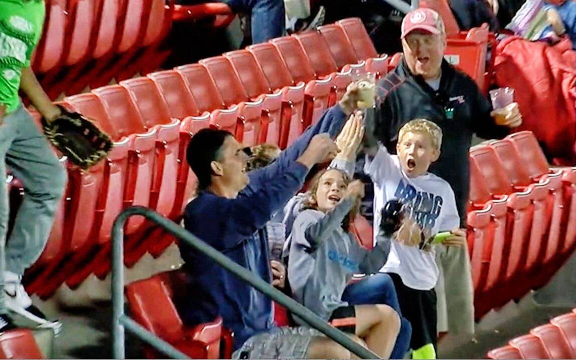 Mudcats’ fan catches foul ball in beer cup
