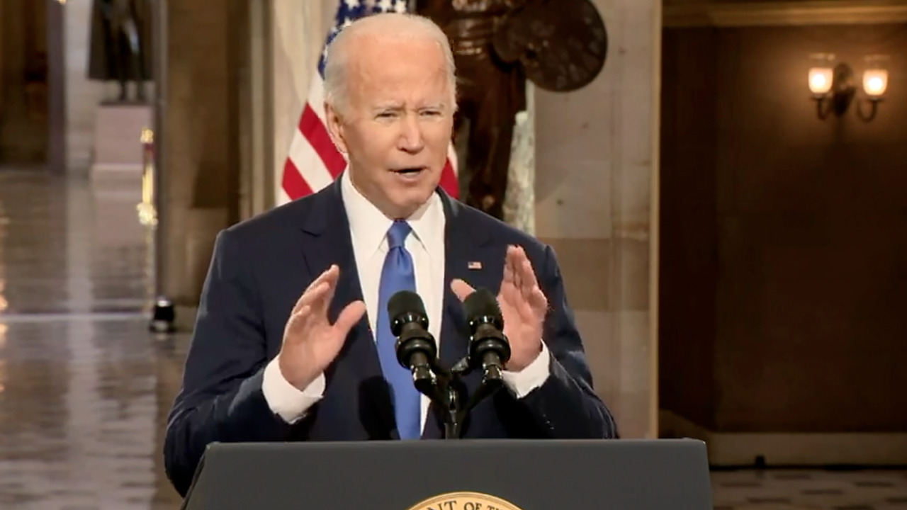 Biden condemns Trump as a threat to democracy as he marks one year since Jan. 6 attack