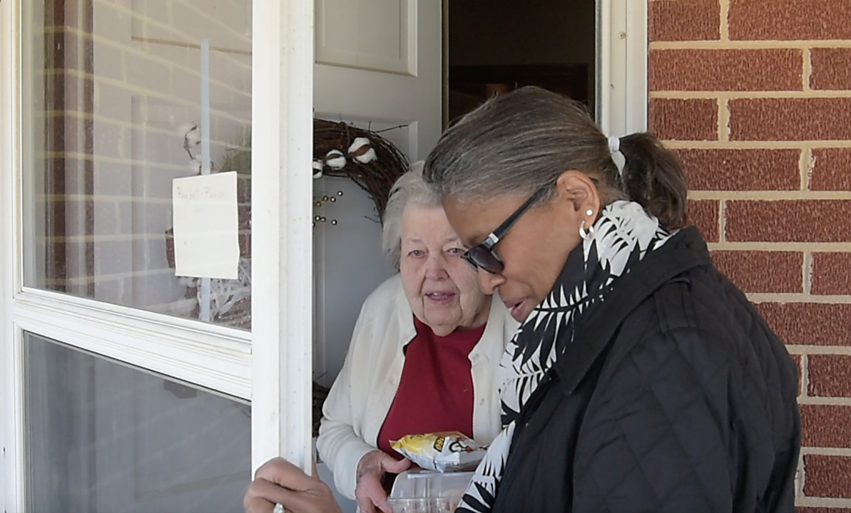 Retirees deliver meals and visit with some of the county’s oldest residents