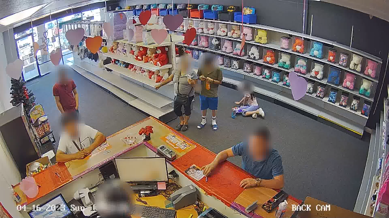 Gunman robs toy store with 3 kids inside, Arizona video shows ...