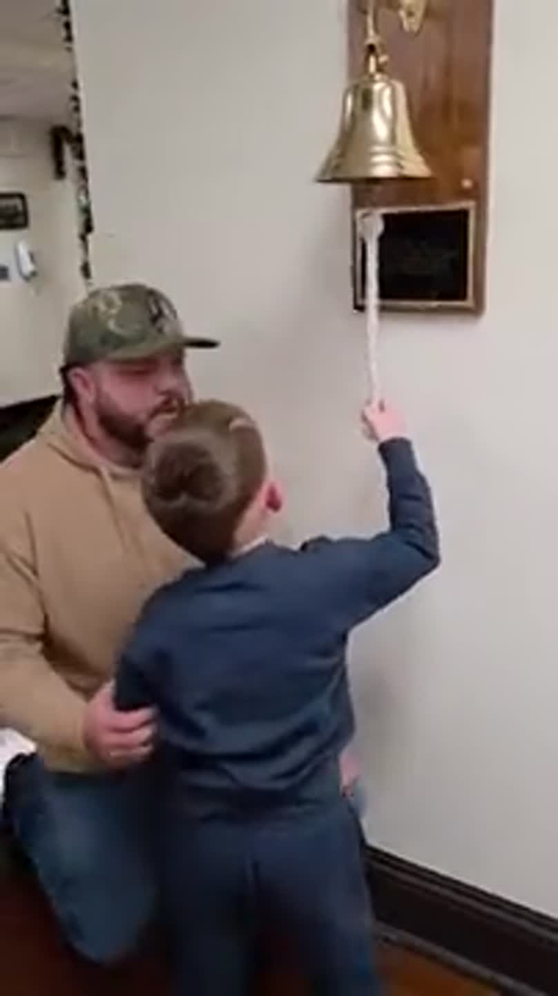 Rhett Eubanks rings hospital bell after completing radiation therapy