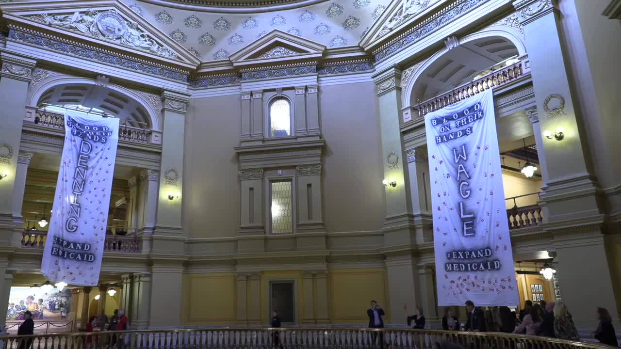 ACLU of Kansas sues state officials over removal of pro-medicaid banners