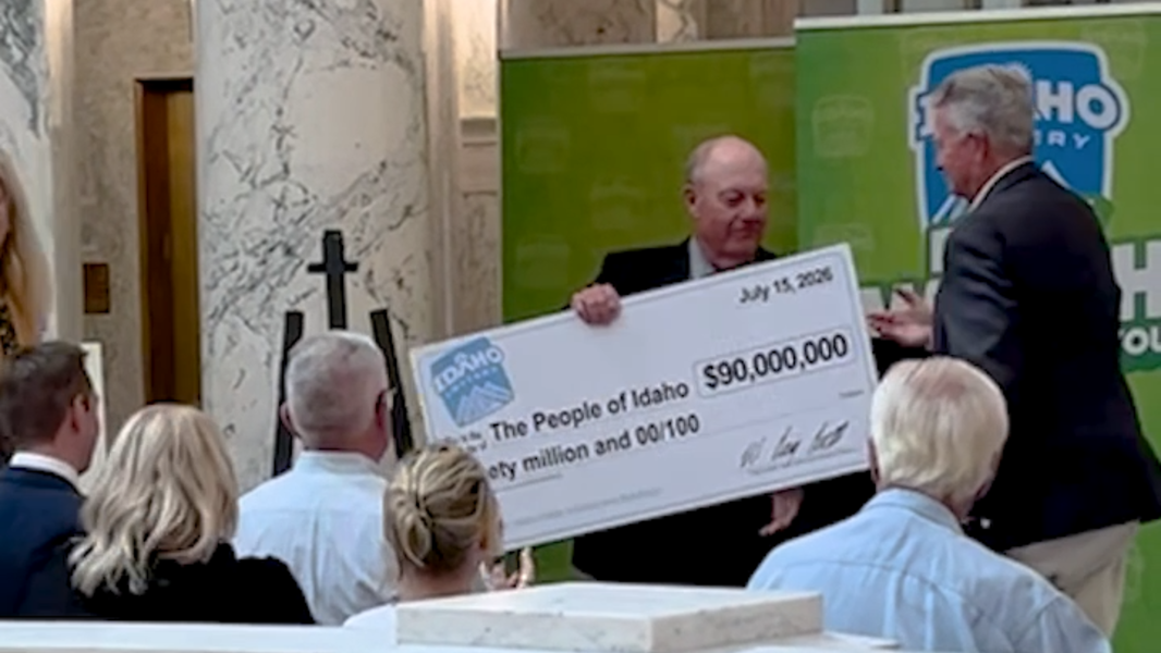 Idaho Lottery hands a giant check to the 'people of idaho'