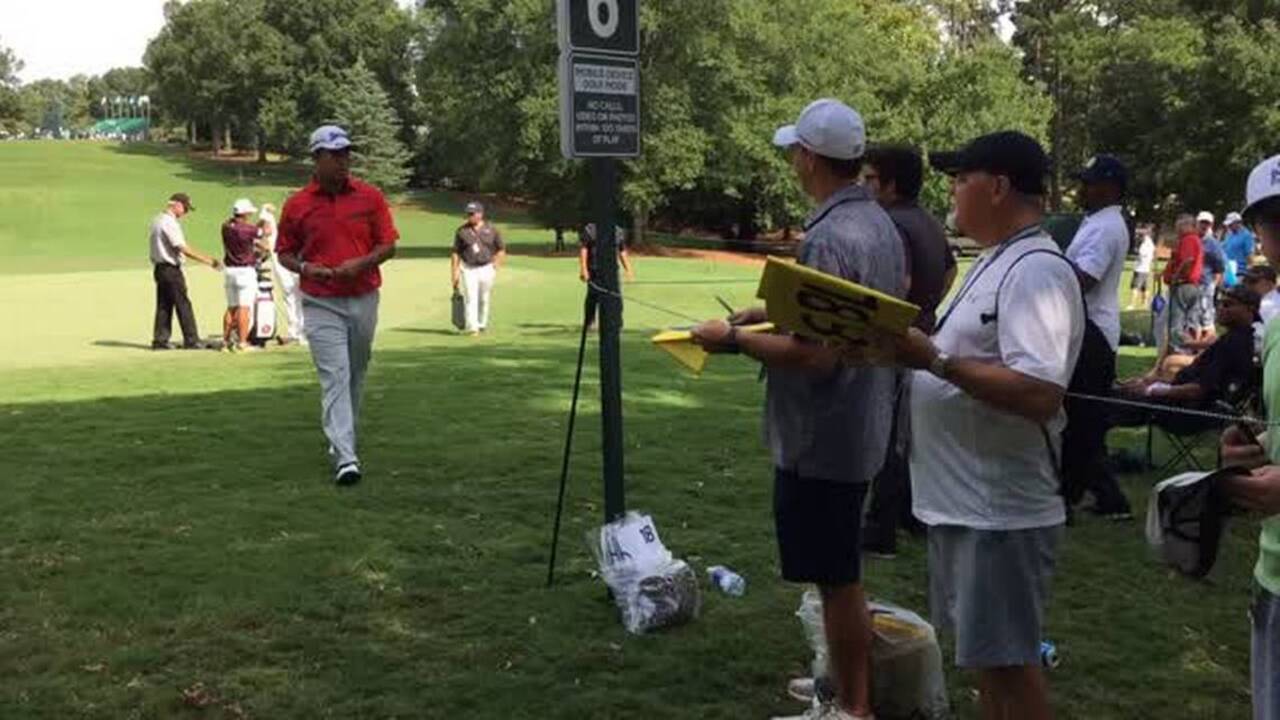 Hideki Matsuyama signs for fans
