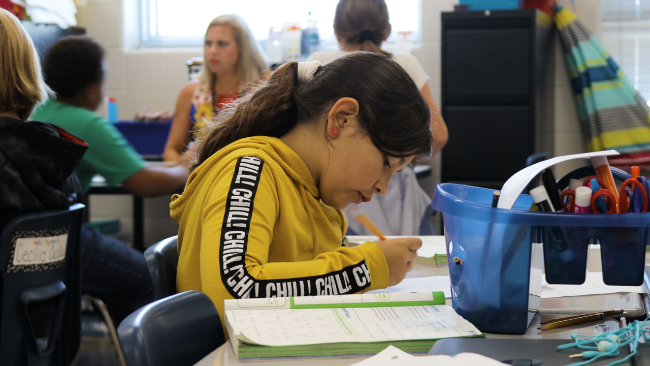 How did Squires Elementary in  Lexington make big gains on state achievement tests?