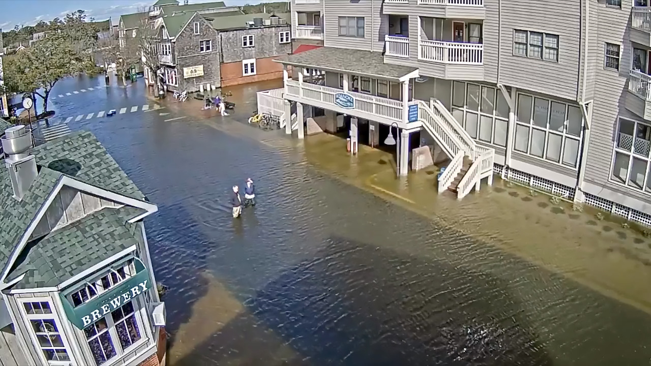 Strong winds push storm surge onto Outer Banks, flooding roads, video and photos show