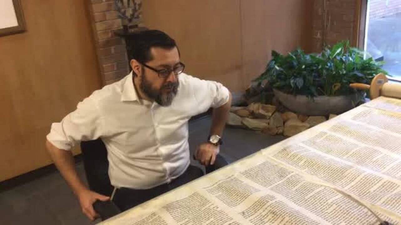 Sofer checks out thousands of letters as he repairs Torah at Temple Israel
