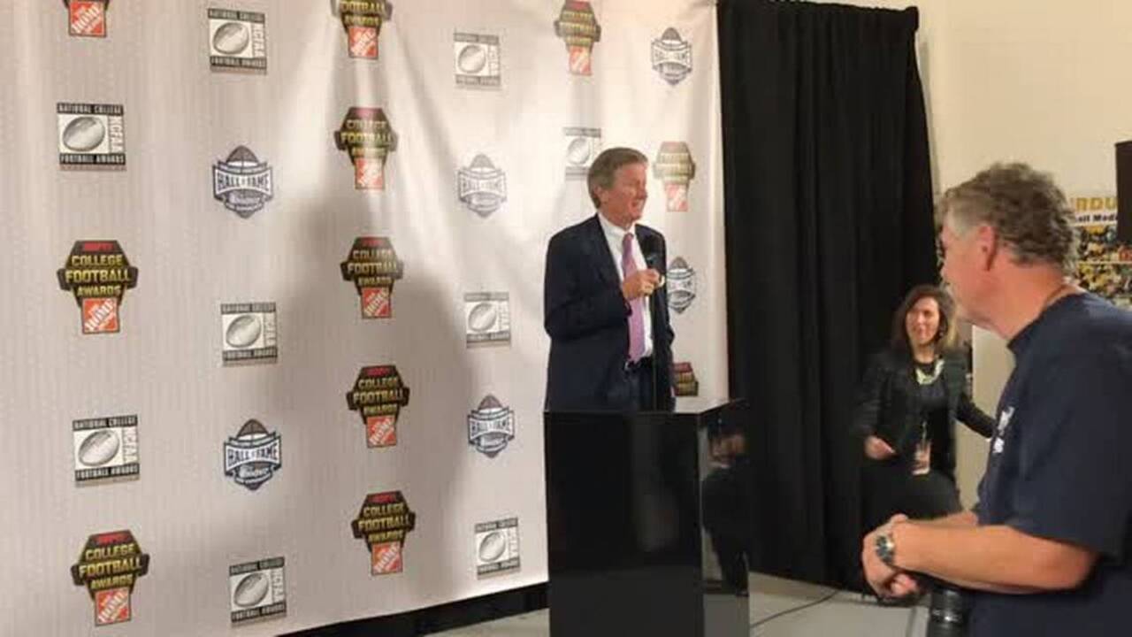 Spurrier in vintage form speaking at College Football Awards show