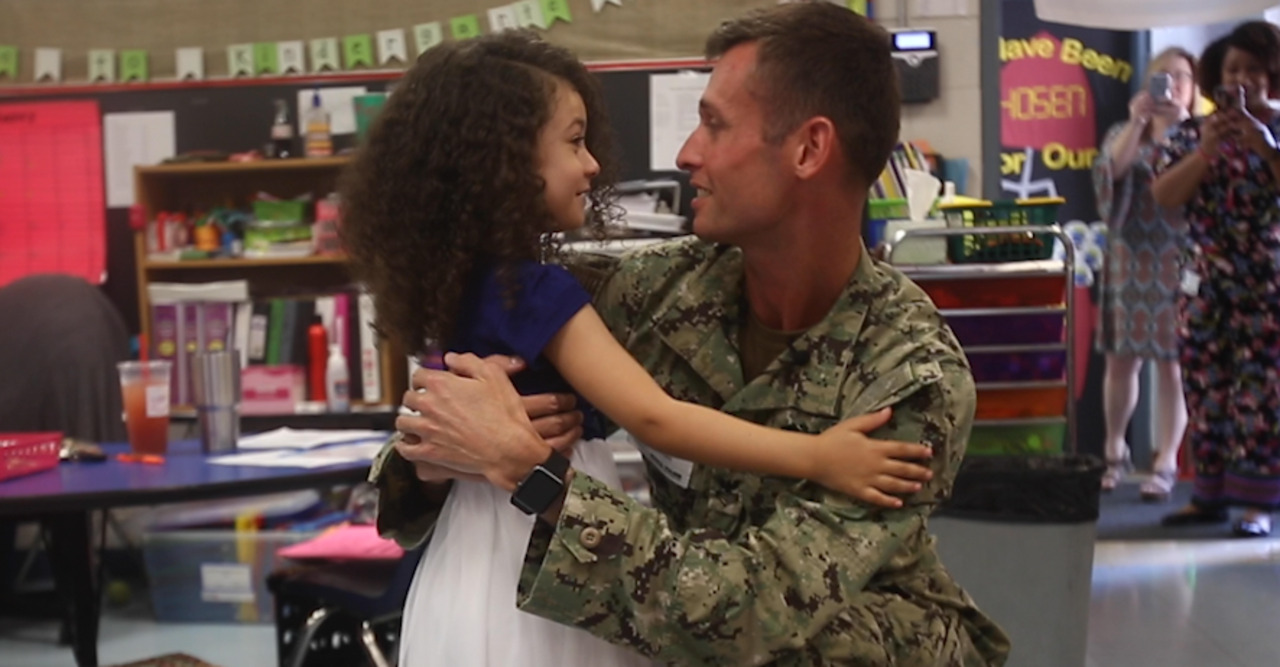 Navy dad surprises daughter at Coast school after six-month deployment