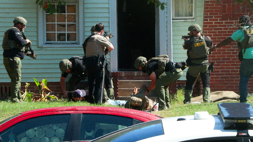 Raw Video: Law enforcement responds to Columbus, GA house, makes multiple arrests