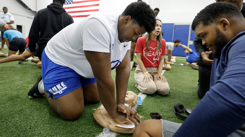 Duke football players learn lifesaving CPR techniques