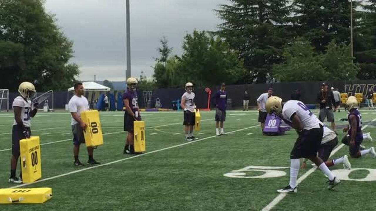 Tackling drill on Day 2 of UW fall camp