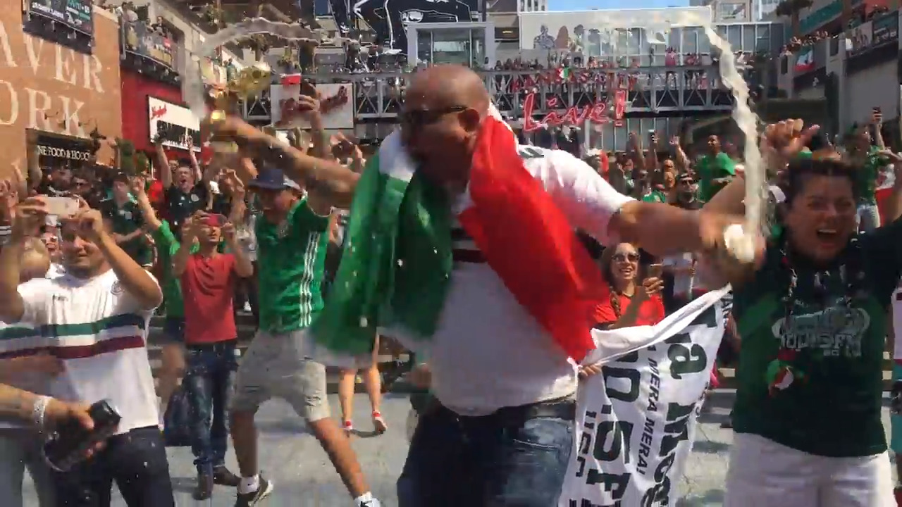 Mexico fans at Power and Light celebrate advancing in the 2018 World Cup