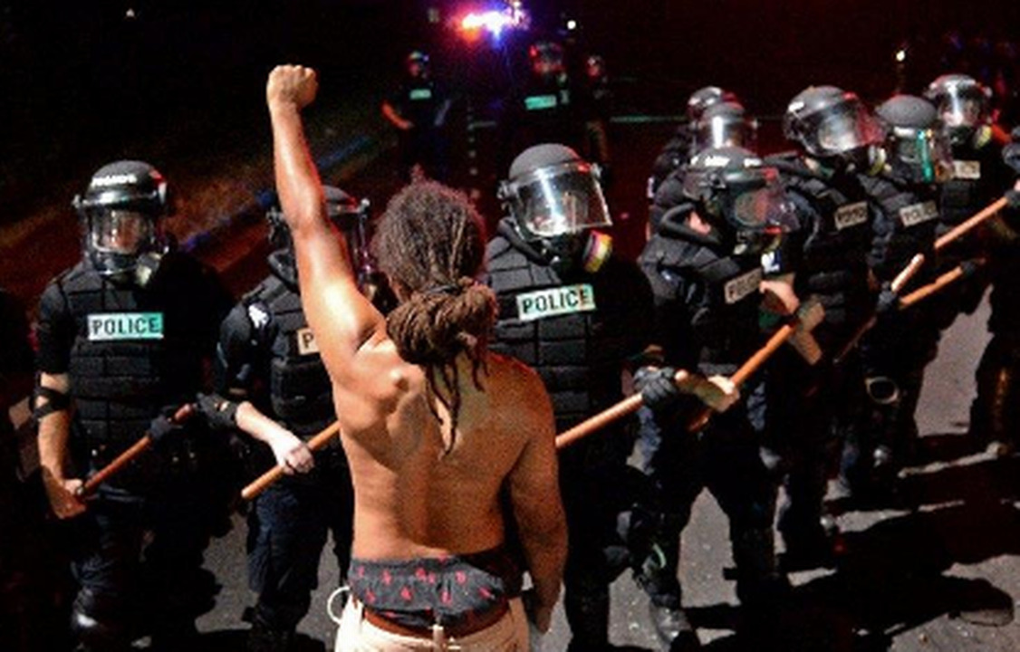 11 arrested in overnight protests, charges ranging from carrying gun to assaulting officer