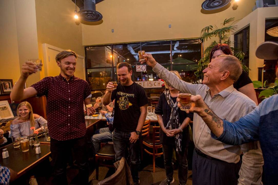 Well-lubricated conversation flows along with beer at Sacramento Stammtisch