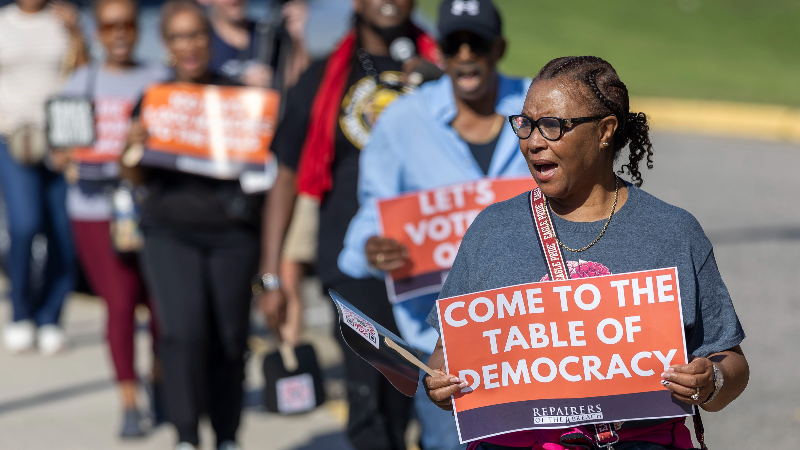 Early voting begins in North Carolina: Durham activists march to mobilize voters