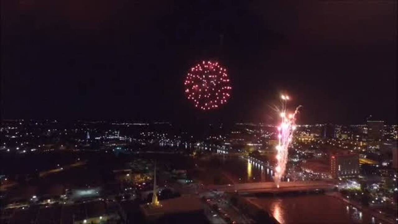 Watch as a drone flies through a fireworks show