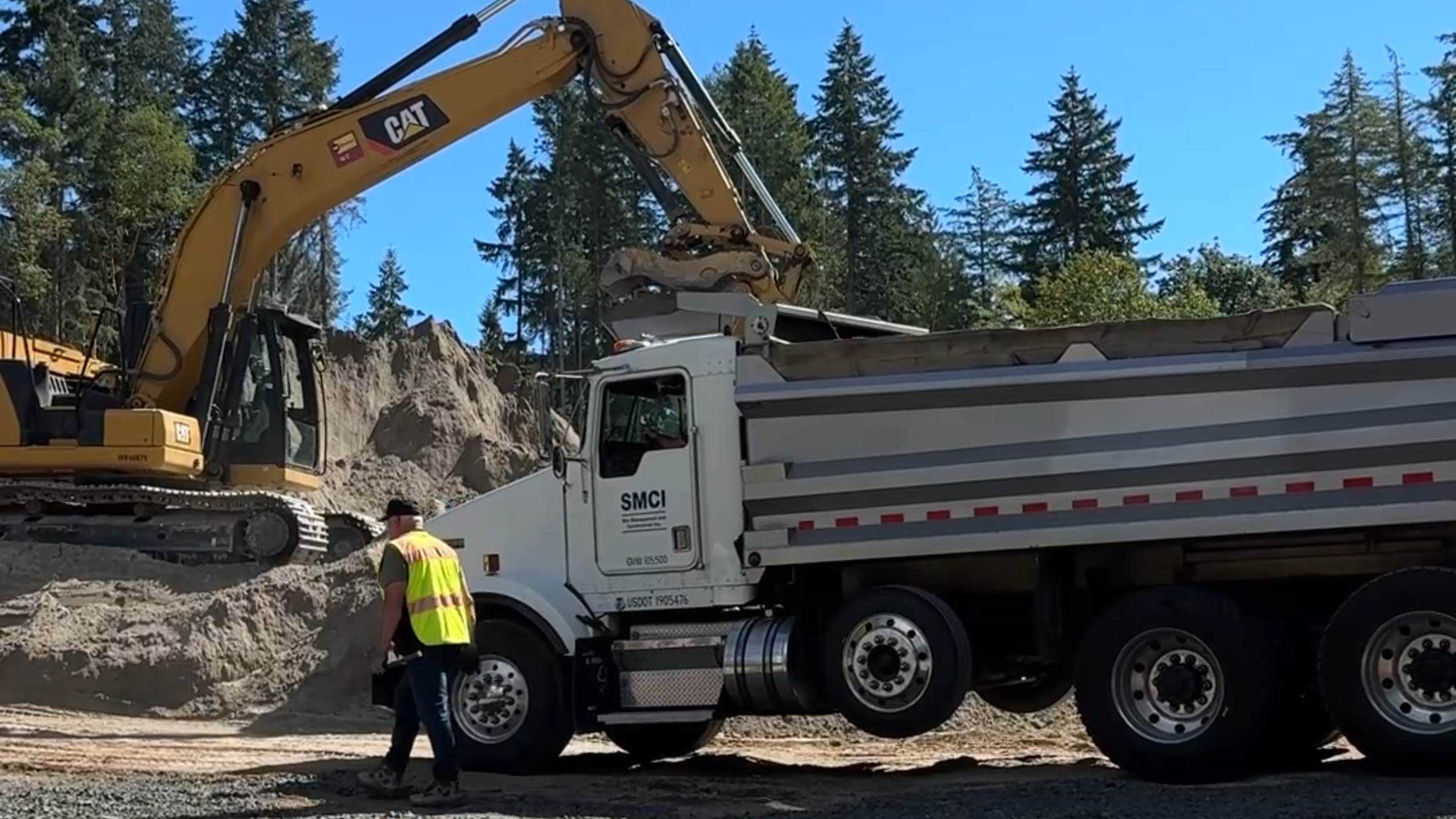 Crews clear land for apartments, homes on Burnham Drive