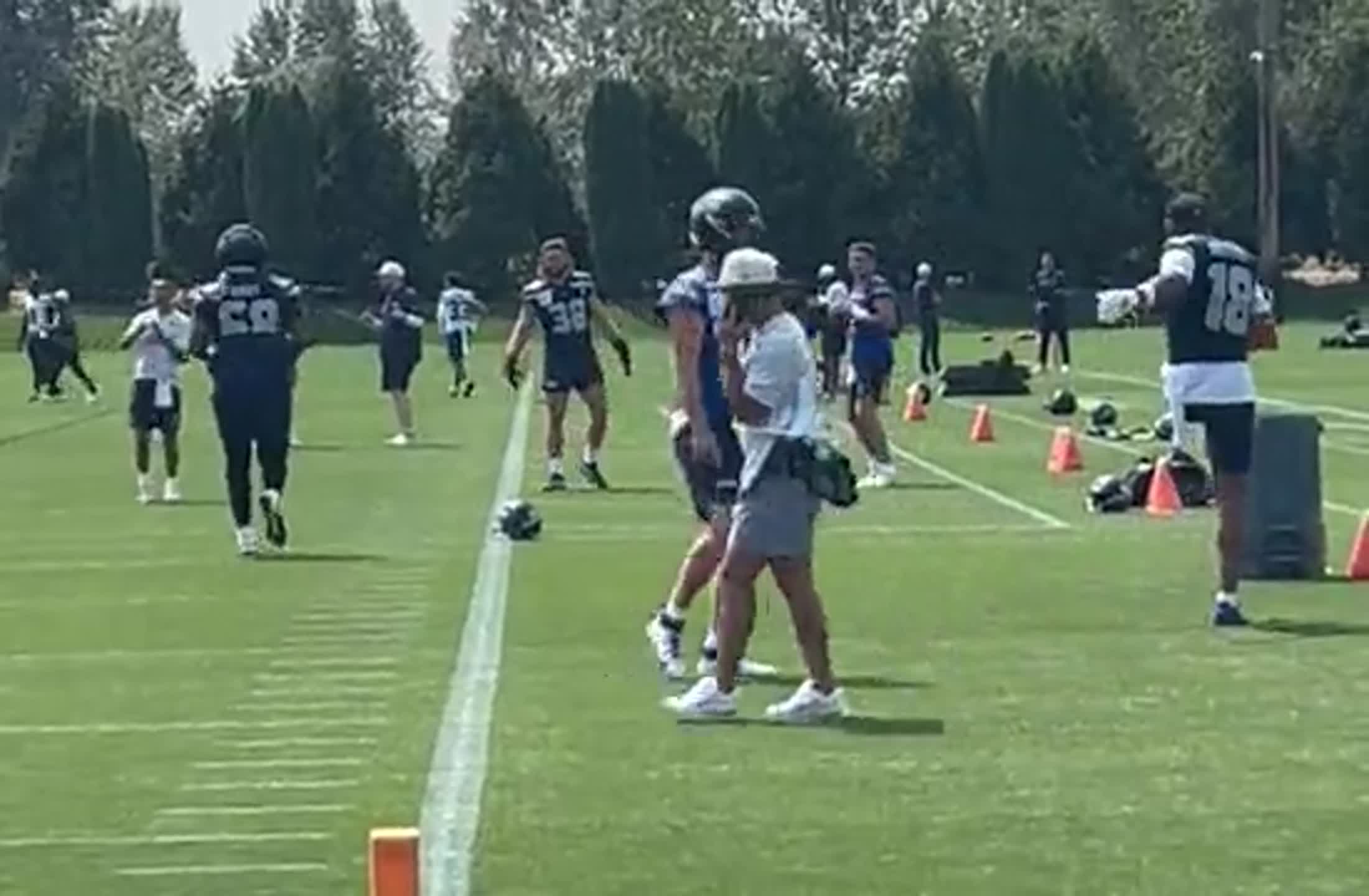 Sam Darnold warms up for the 17th practice of Seahawks training camp