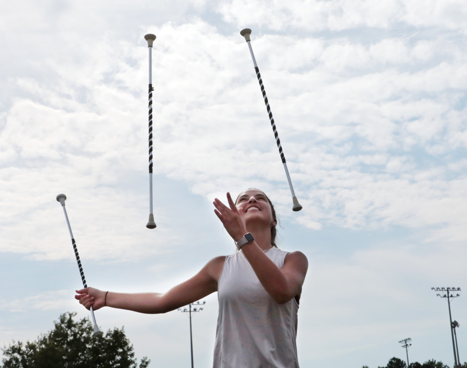 Clover baton twirler shines in Friday night halftime shows and on international stage