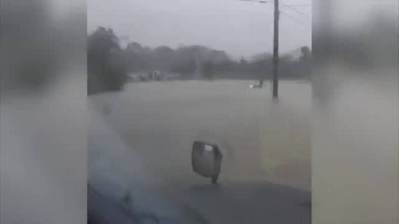 North Carolina police rescue woman and child from car trapped in Hurricane Matthew flood waters