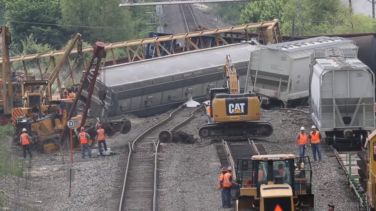 Multiple derailed train cars close street in Fort Worth, down power lines