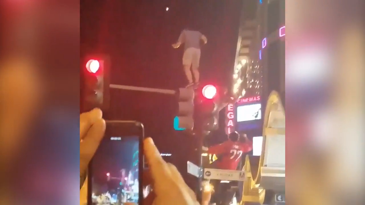Washington Capitals fans climb light poles, erupt in joy after Stanley Cup win