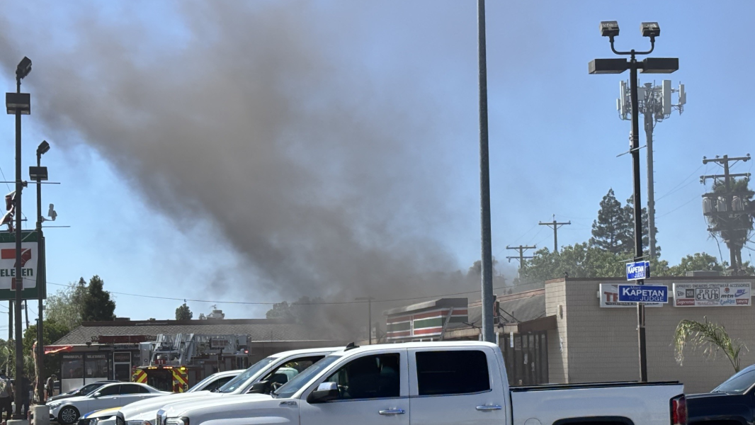 Fire crews respond to an attic fire next to 7-Eleven in Fresno
