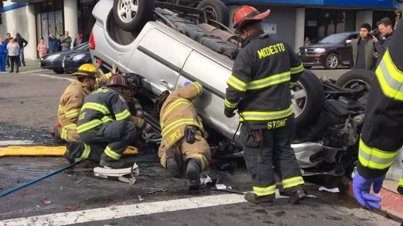 Woman pulled from vehicle after rollover wreck in downtown Modesto